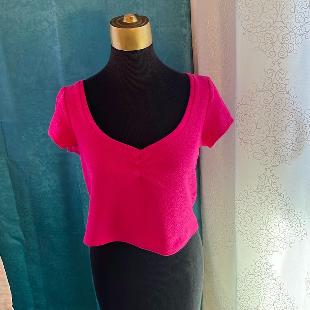 Pretty in pink sweetheart neckline blouse.